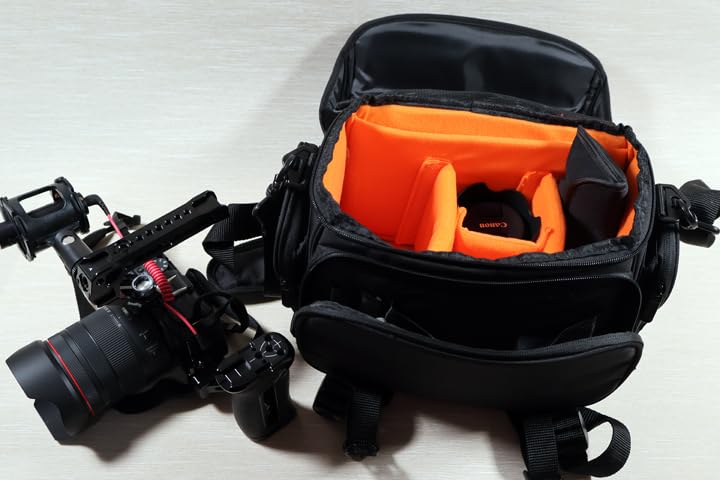 Amazon Basics Large DSLR Gadget Bag with Multiple Compartments, Pockets, Shoulder Strap, Black with Orange Interior customer photo 2