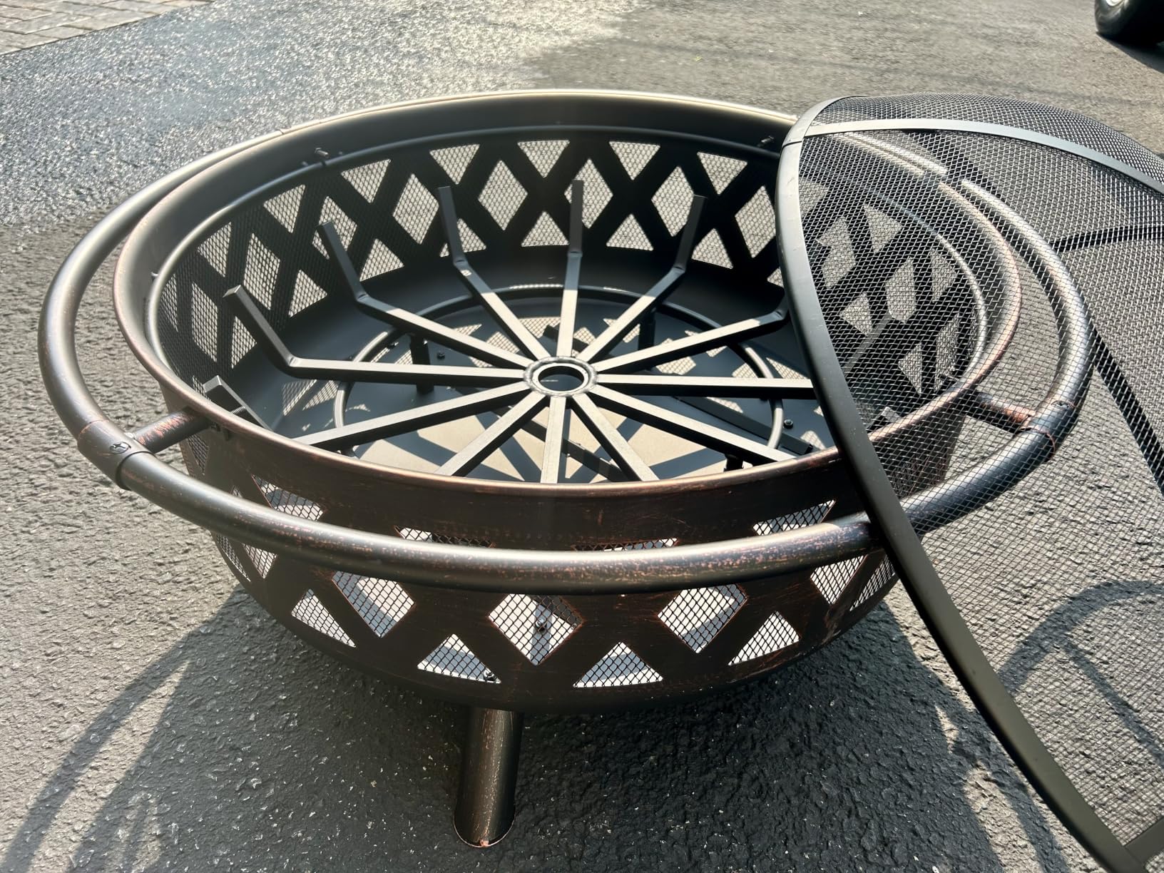 Sunnydaze Crossweave Outdoor Fire Pit - Wood-Burning Fire Pit for Outside with Spark Screen, Poker and Round Cover - Steel Patio Firepit for Backyard, Deck, Porch - 36-Inch - Black customer photo 2