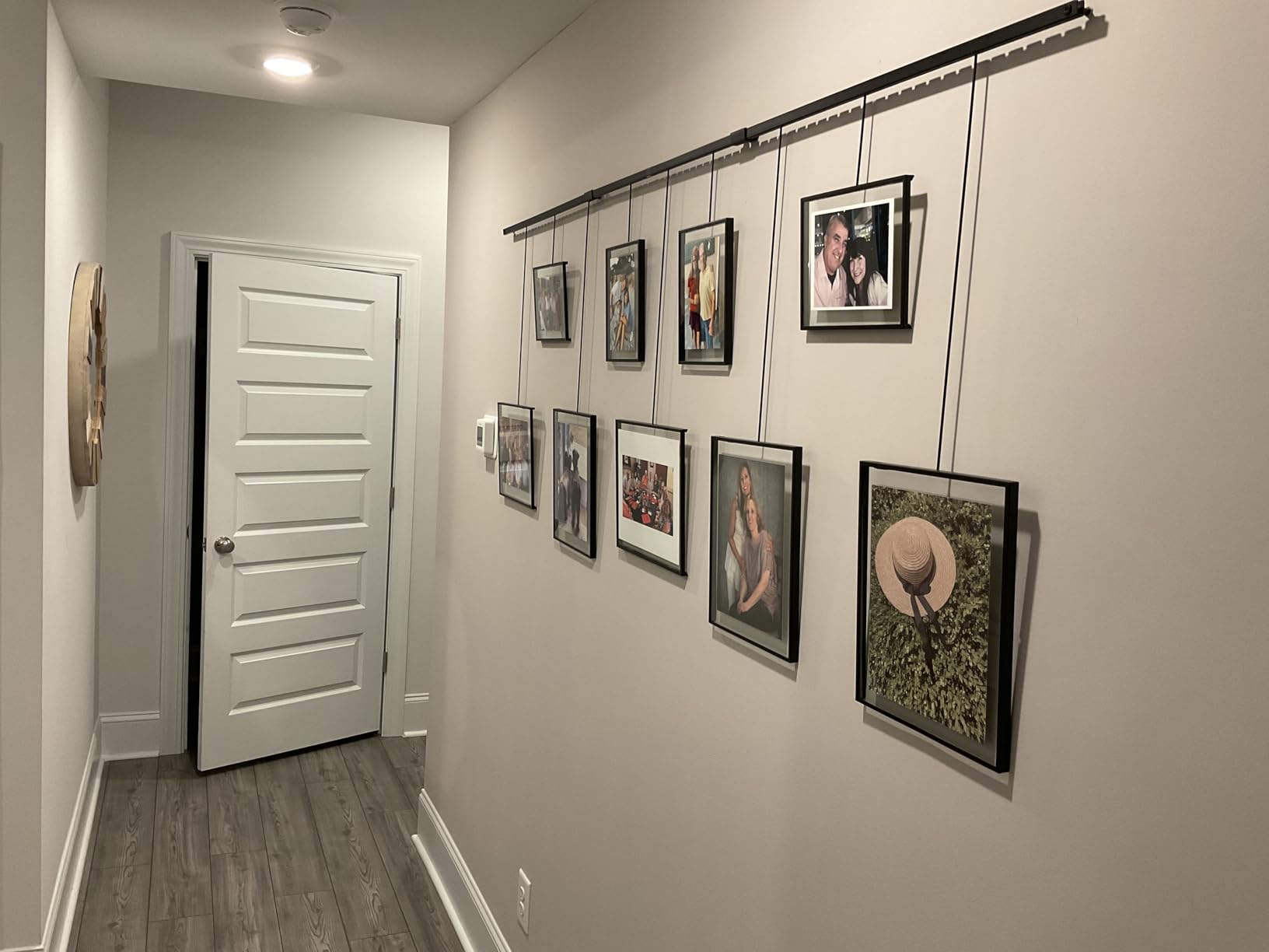 Umbra Exhibit Gallery Picture Frames, Adjustable Wall, Set of 9, Black | Steel, movable hanging rods, holds 8x10 and 5x7 sizes, minimal screw holes, mounting hardware included customer photo 2