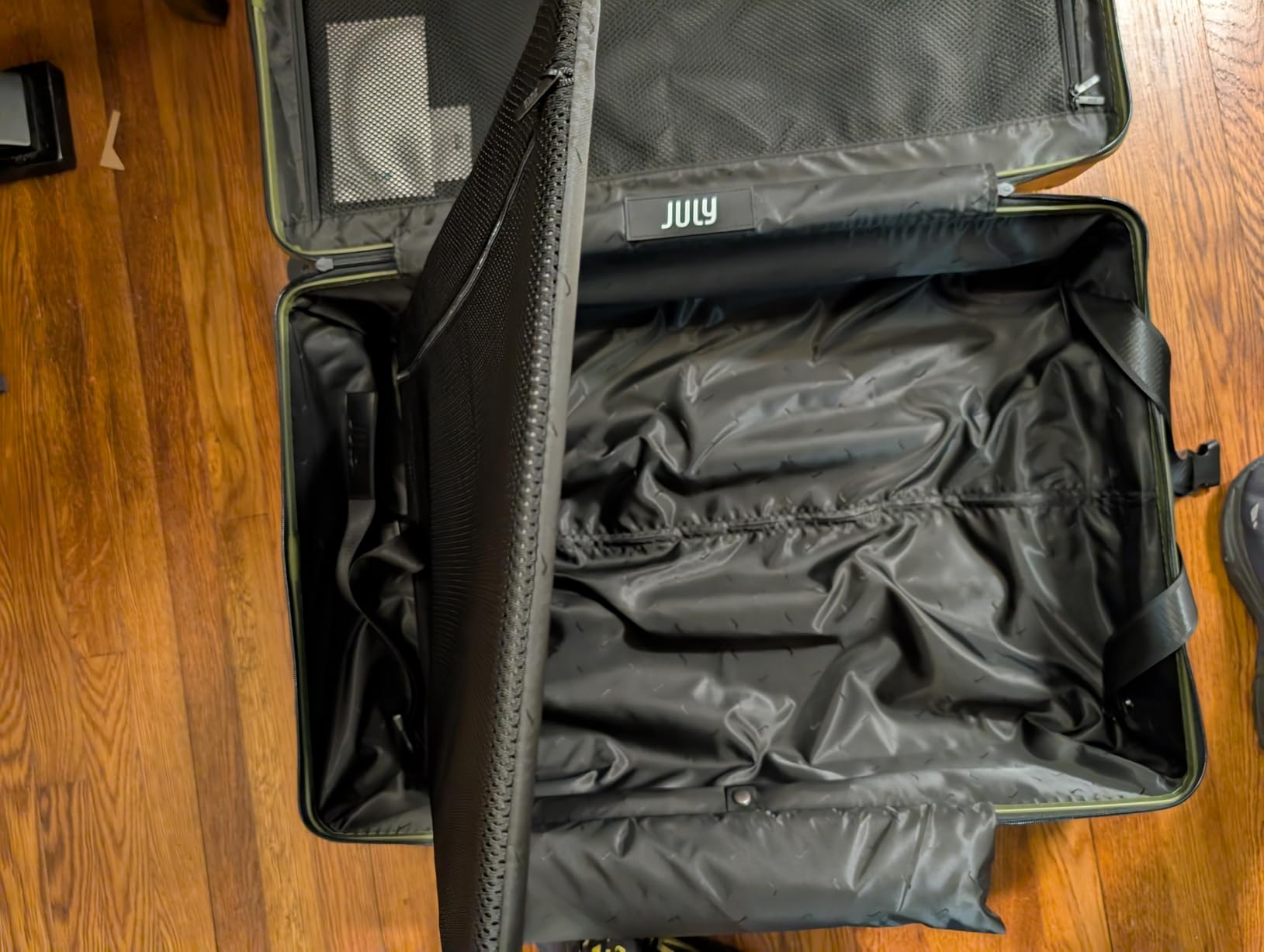 July Checked Plus with CaseSafe - 28.75 Built in Tracking, Airline Approved Check In Luggage with Wheels, Rolling Suitcase for Men & Women - Silent Spinner Wheels, Y-Strap - Charcoal customer photo 1