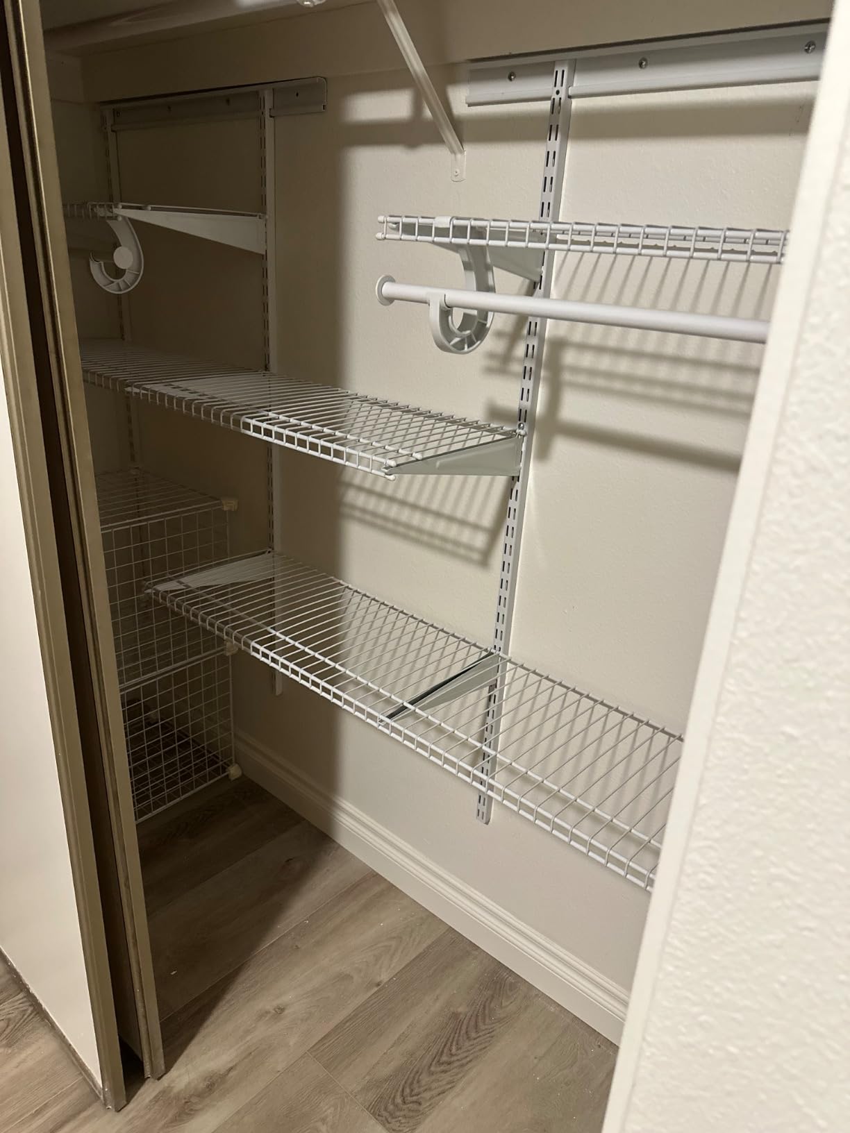 ClosetMaid ShelfTrack Wire Closet Organizer System, Adjustable 4-6 Ft. with Shelves, Clothes Rods, Hardware, Durable Steel, White customer photo 1