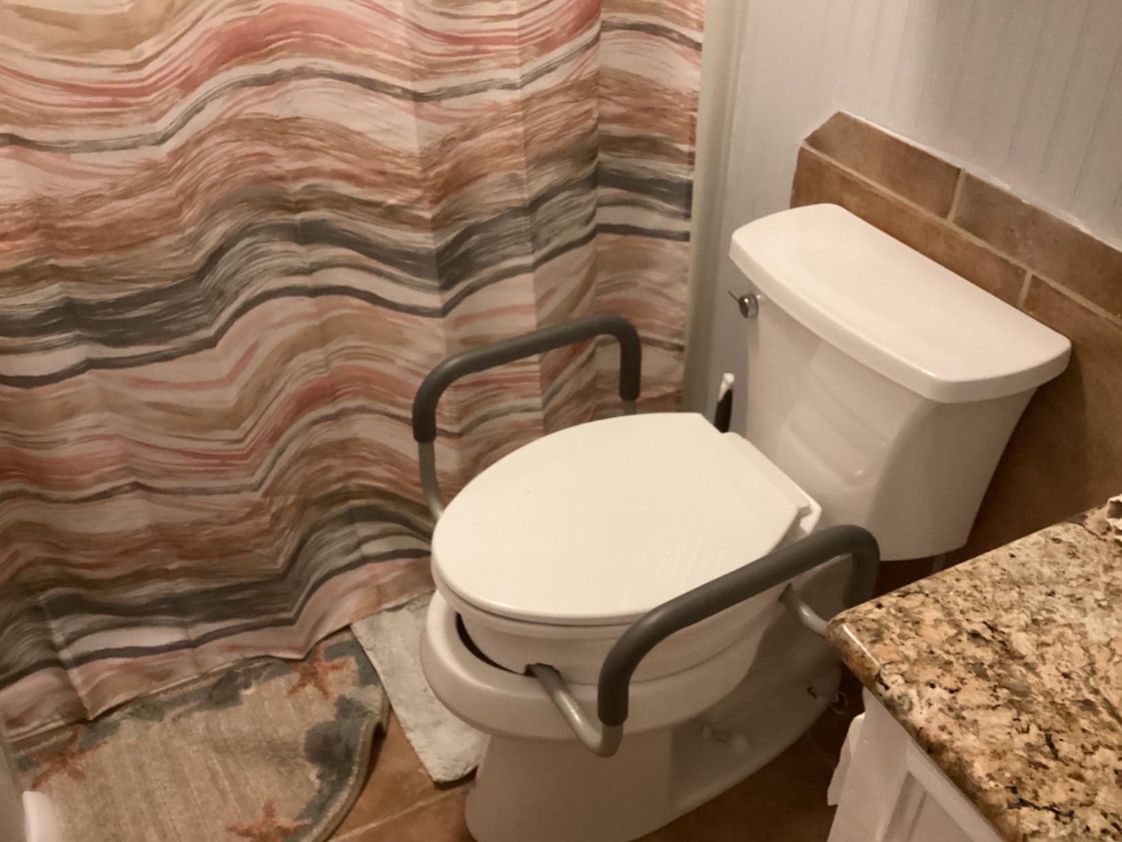 Carex 3.5 Inch Raised Toilet Seat with Arms, Elongated Toilet Seat Riser, Up to 250 lbs Capacity, Elevating & Raising Seat for Elderly & Handicap, Universal, Slip-Resistant with Padded Handles, White customer photo 1