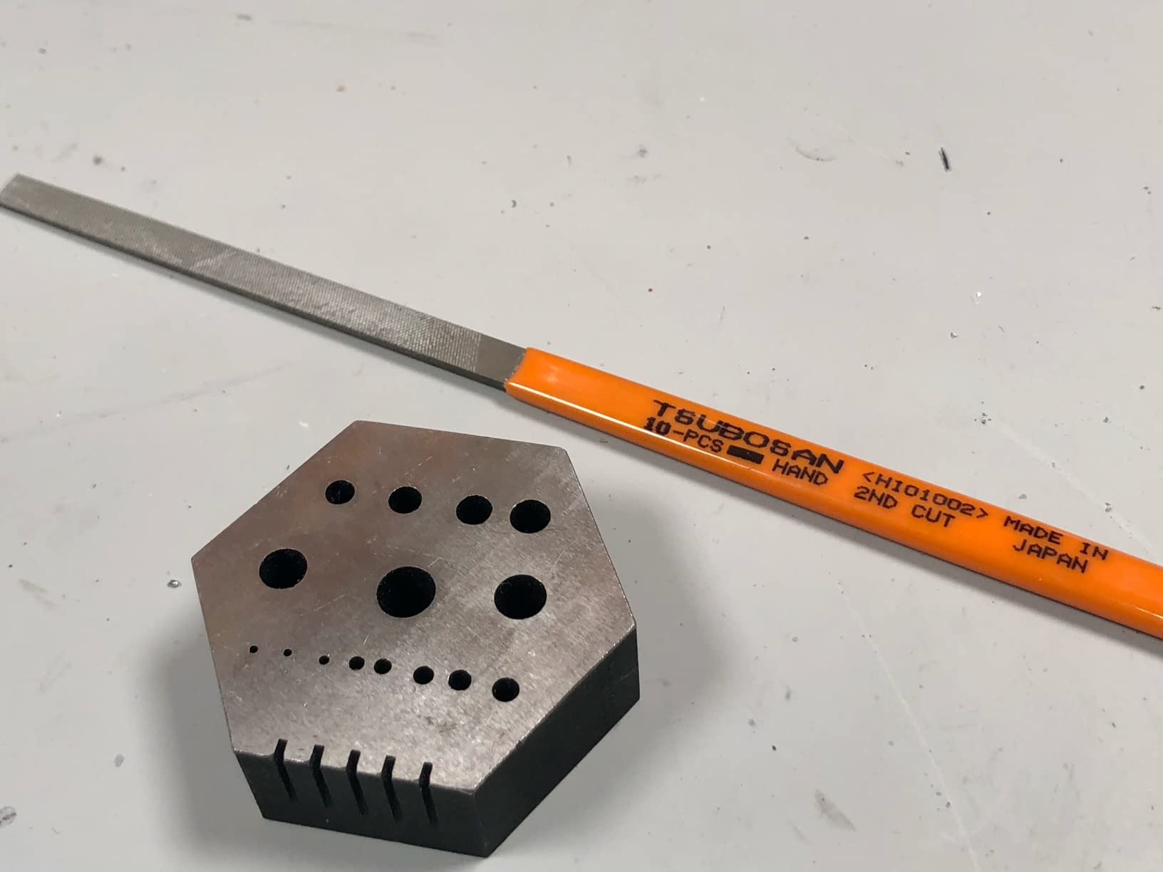 Hexagonal Jewelry & Watchmaker Anvil Block Hardened Steel Staking Riveting Drilling Bench Block with 15 Holes and 5 Slots for Jewelry Repair Metalworking Watchmaking Tools customer photo 1