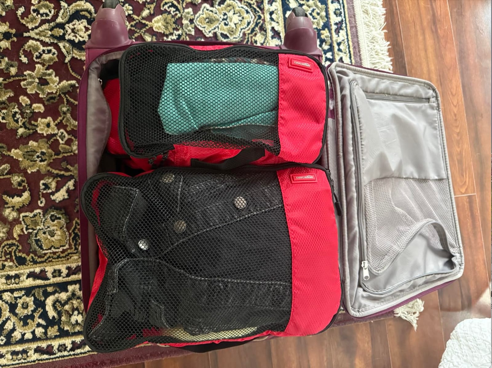 Amazon Essentials 4-Piece Packing Cubes Travel Accessories Set, Space-Saving Luggage Organizers with Double Zipper, Mesh Top, Small/Medium/Large/Slim, Blue (Previously Amazon Basics) customer photo 1