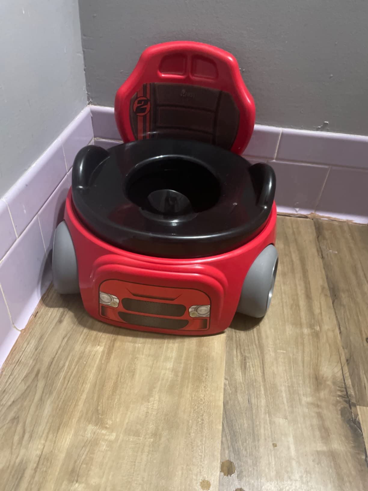 The First Years Training Wheels Racer Potty Training Toilet - Race Car Training Potty - Includes Detachable Toddler Toilet Seat and Kids Potty - Ages 18 Months and Up customer photo 2