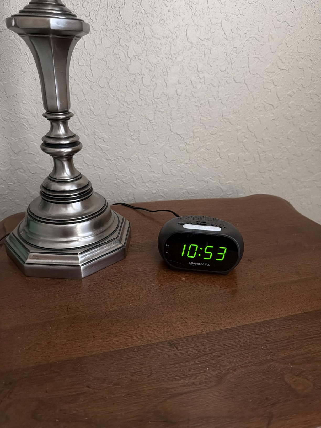 Amazon Basics Small Digital Oval Alarm Clock with LED Display, Nightlight, Snooze Function & Battery Backup, Black, 4.5 x 3.5 x 2.4 Inches customer photo 1