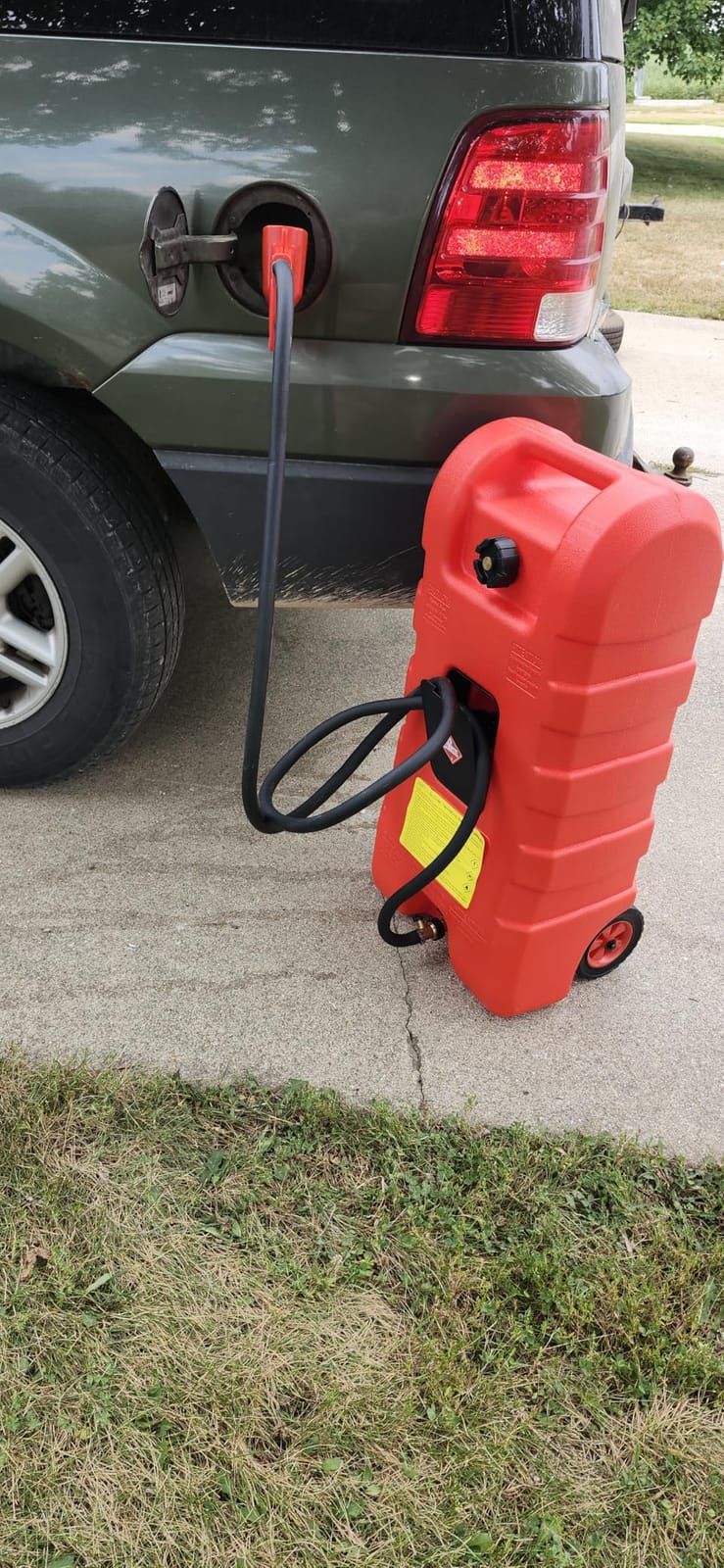 15 Gallon Gas Can, Fuel Tank Container with LE Fluid Transfer Manual Siphon Pump & 10FT Hose, Portable Diesel Gas Storage Caddy with Wheels for Car, ATV, Weeder, Boat, etc., Red customer photo 2