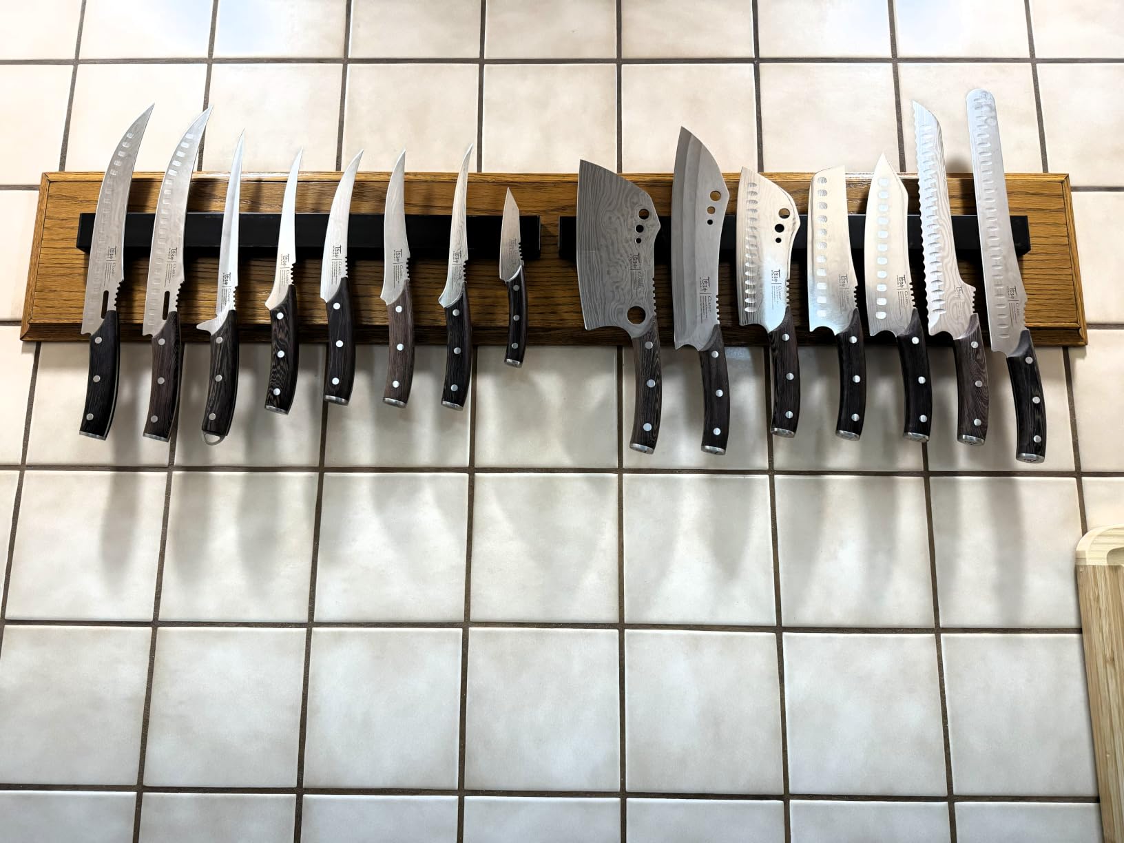 Dmore magnetic knife holder for wall—with 2 hooks, No Drilling 10 Inch black knife magnetic strip, Powerful knife magnet rack, include Adhesive Tape and screws for Knives, Utensils, and Tools customer photo 2